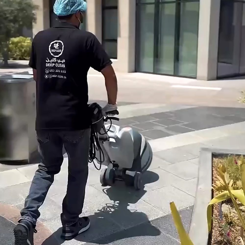 Cleaning commercial plaza walkways